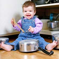 Baby banging pots and pans