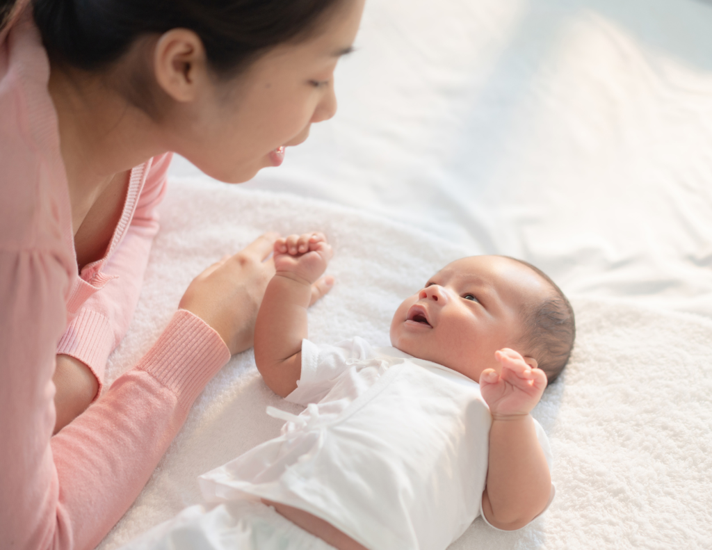 Mum interacts with baby